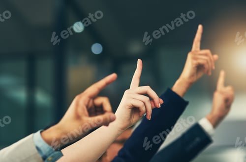 Preview: Make yourself heard. Cropped shot of a group of businesspeople raising their hands.