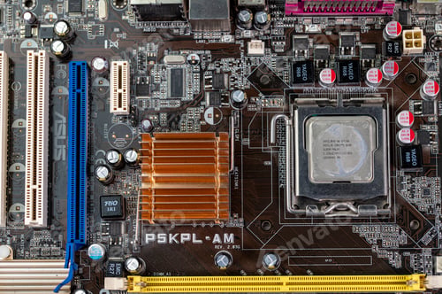 Preview: detail of a motherboard with connectors and heatsinks