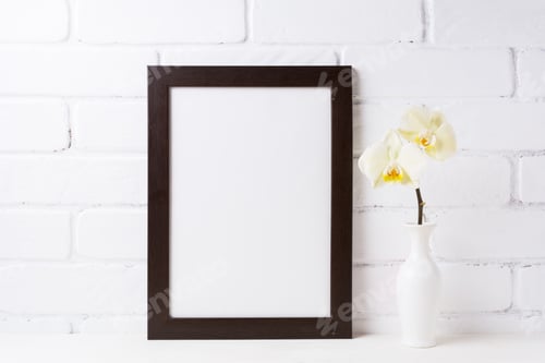 Preview: Black brown frame mockup with soft yellow orchid in vase