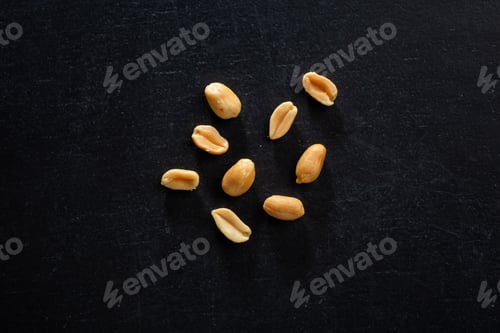 Preview: Peanut in bowl on dark background
