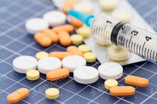 Preview: Pills and injection syringe