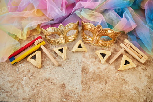 Preview: Purim celebration concept. Jewish carnival background. hamantaschen or hamans ears cookies, carnival