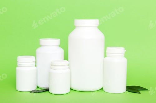 Preview: supplement pills with medicine bottle health care and medical top view. Vitamin tablets