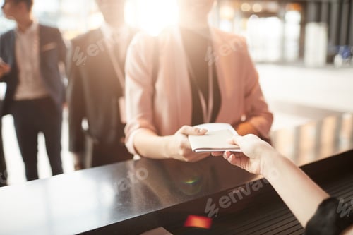 Preview: Businesswoman taking brochure at conference