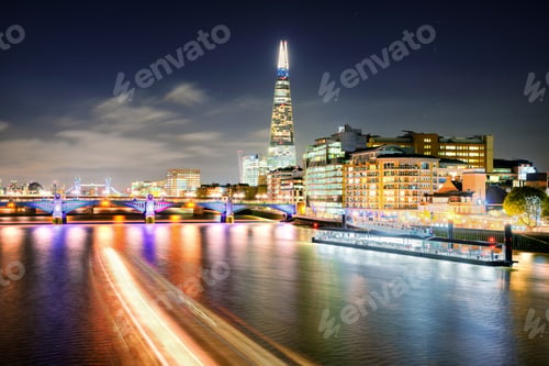 Preview: London at night at Thames river, United Kingdom
