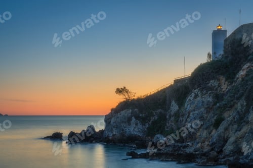 Preview: Talamone lighthouse at sunset. Maremma, Argentario, Tuscany, Italy