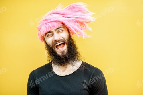 Preview: Man with color hair on the yellow background