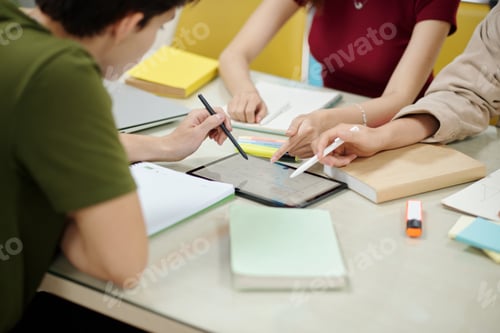 Preview: Students Pointing at Tablet Computer