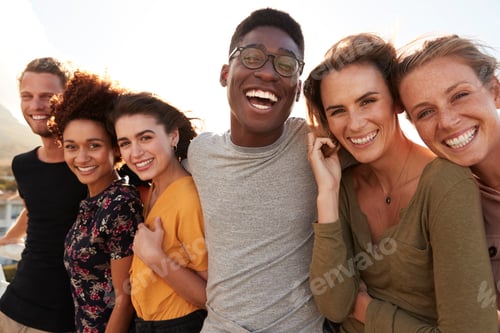 Preview: Portrait Of Smiling Young Friends Walking Outdoors Together