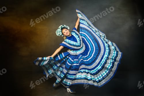 Preview: A woman in a blue and white dress is dancing