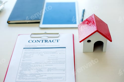 Preview: House and land purchase contract form on the brokerage desk of a real estate company.