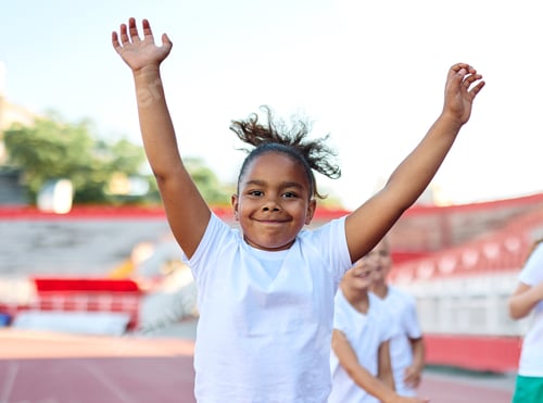 Preview: Children having sport exercise training class outdoors