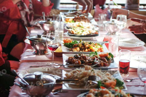Preview: Family dinner table with delicious food.