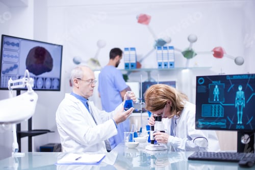 Preview: Groupe of researchers in pharmacology in a hospital laboratory