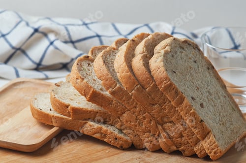 Preview: Sliced whole wheat bread on the wooden board
