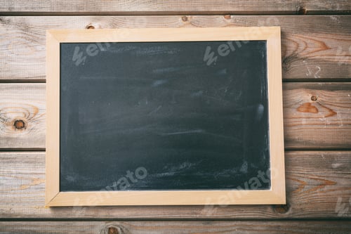 Preview: Blank blackboard with frame on wooden wall background