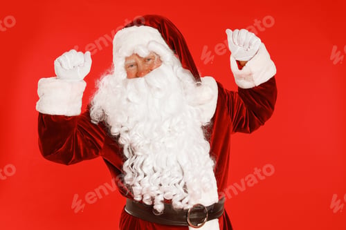 Preview: Happy authentic Santa Claus on red background