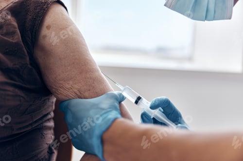 Preview: doctor with a syringe vaccine passport pandemic coronavirus