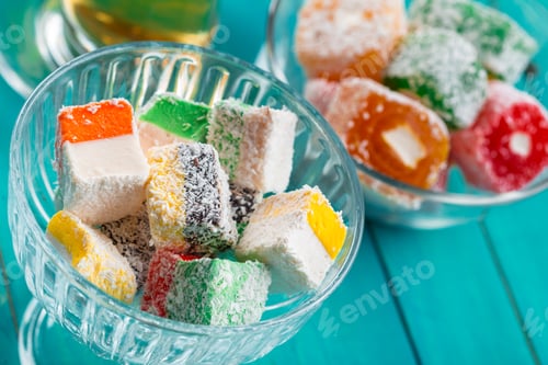 Preview: various pieces of turkish delight lokum and black tea