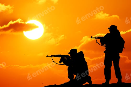 Preview: Silhouette shot of soldier holding gun with colorful sky and mountain in background
