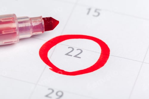 Preview: Reminder of an important date marked on a calendar with a red pen on a plain background