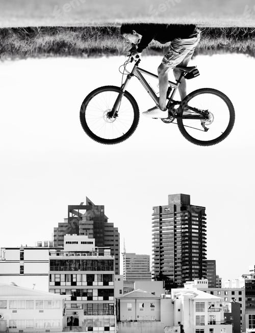 Preview: A man on a bicycle hovers in the air over the rooftops of a city - perception