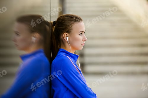 Preview: Female runner having break