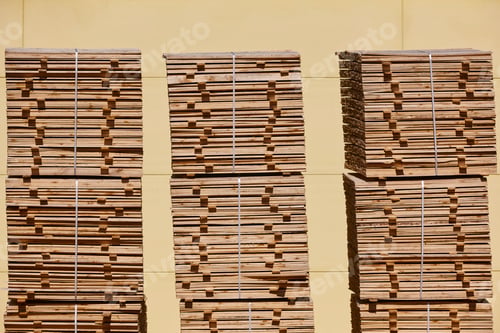 Preview: Cut and stacked pieces of wood. Industrial sawmill. Manufacture material