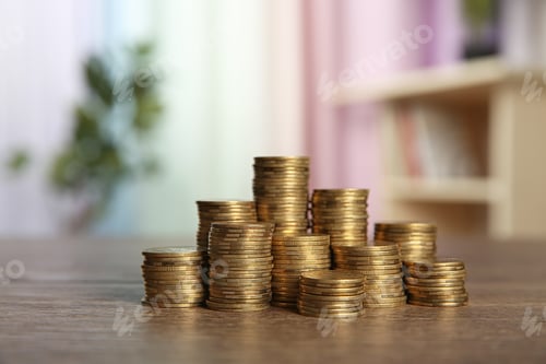 Preview: Many stacks of coins on table in room