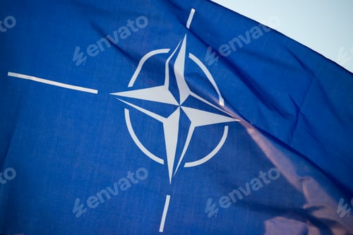 Preview: NATO flag.North Atlantic Treaty Organization flag waving.