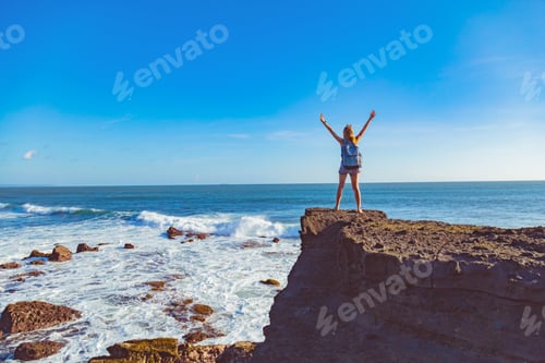 Preview: Girl With Arms Wide Open Enjoying Sea / Ocean Scenery.