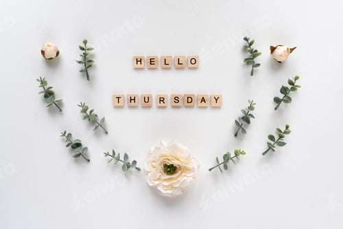 Preview: Hello Thursday words on white marble background