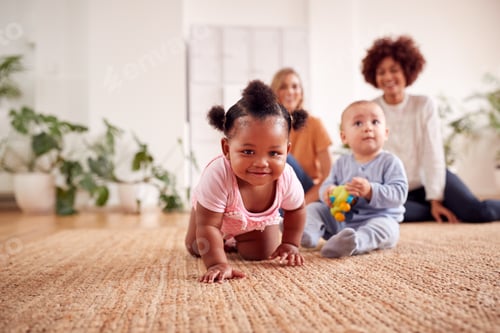 Preview: Two Mothers Meeting For Play Date With Babies At Home In Loft Apartment