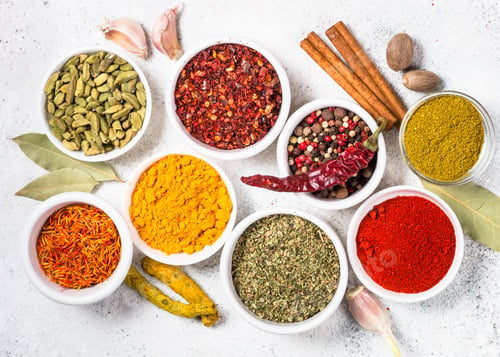 Preview: Colored indian spices on white table