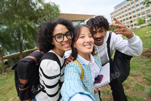 Preview: selfie of three young students at the campus