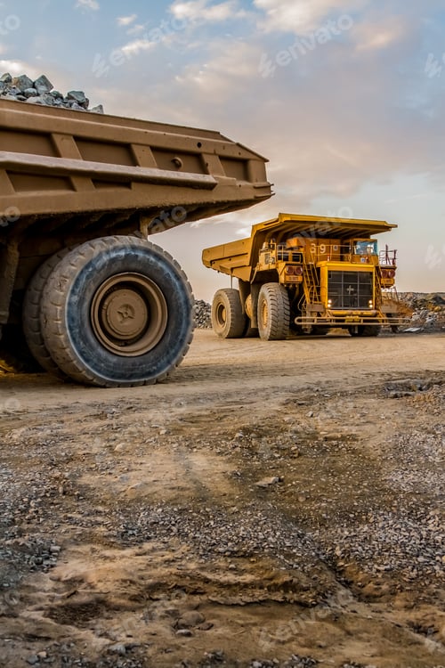 Preview: Mining dump trucks transporting Platinum ore for processing