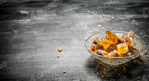 Preview: Crystalline cane sugar in a saucer.
