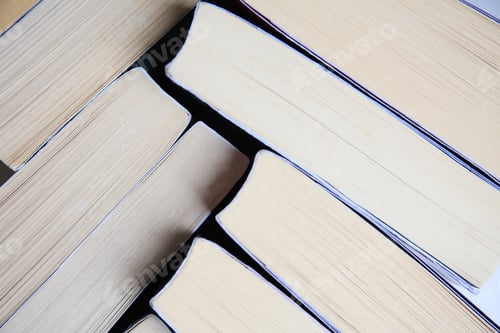 Preview: Collection of different books as background, closeup