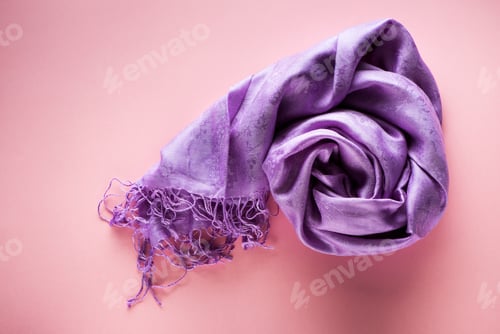 Preview: Silk scarf on a pink background, top view