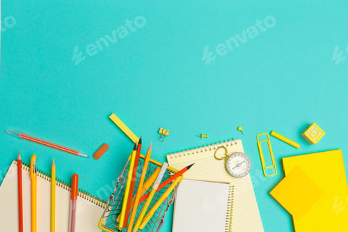Preview: school supplies at colorful paper background