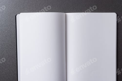 Preview: Close up of open book with copy space on green background