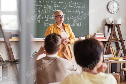 Preview: Teacher teaching students at school