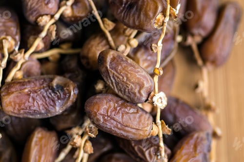 Preview: Natural dried palm fruit isolated. Food concept photo.