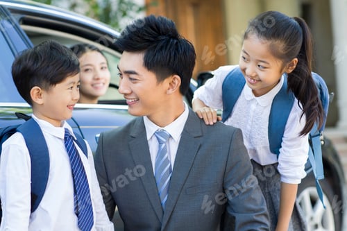 Preview: Young couple sending their children to school