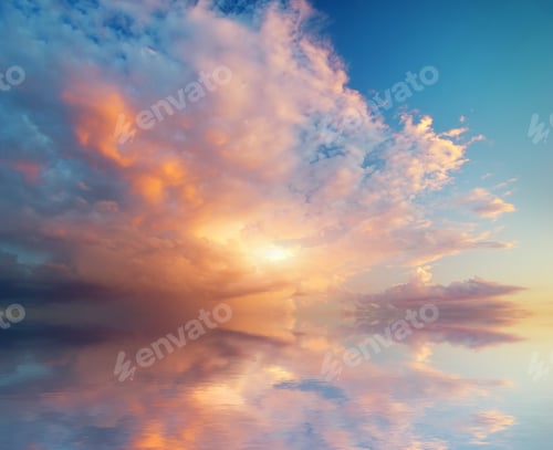 Preview: Colorful Clouds Reflected in Calm Water at Sunset