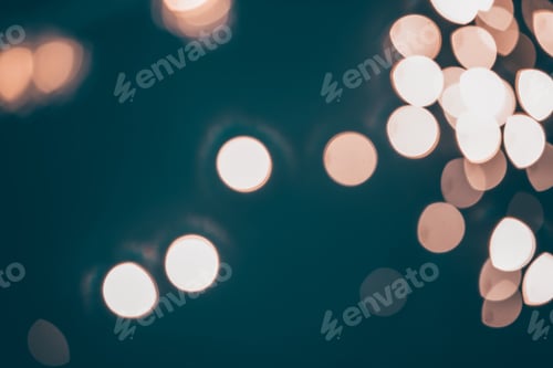 Preview: Blurred Christmas lights over dark blue background