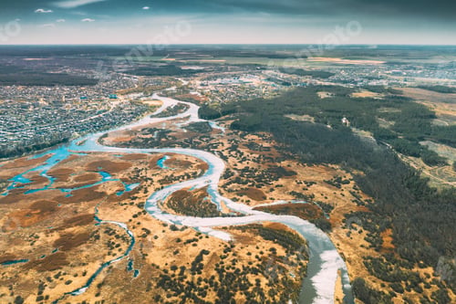 Preview: Belarus, Europe. Aerial View Curved River And Small Town In Early Spring Landscape. River bends