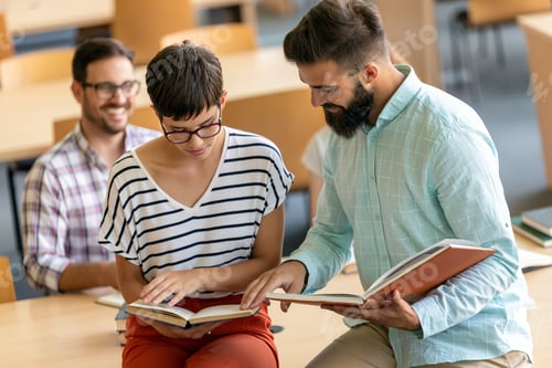 Preview: Education campus friendship people concept. Group of happy students studying together in library.