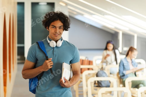 Preview: Handsome student guy with laptop