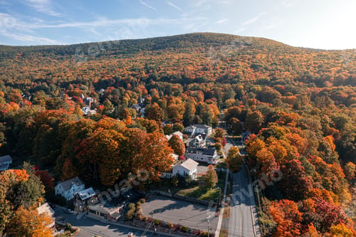 Preview: Aerial view of the New England hill town and autumnal landscape in the UK
